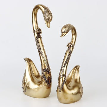 Statuettes – Golden Swans